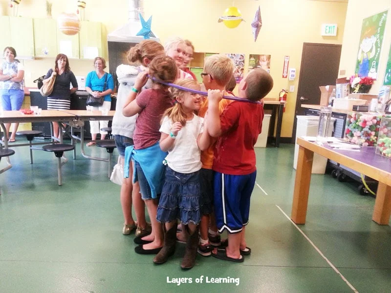 kids in a hula hoop demonstrating states of matter