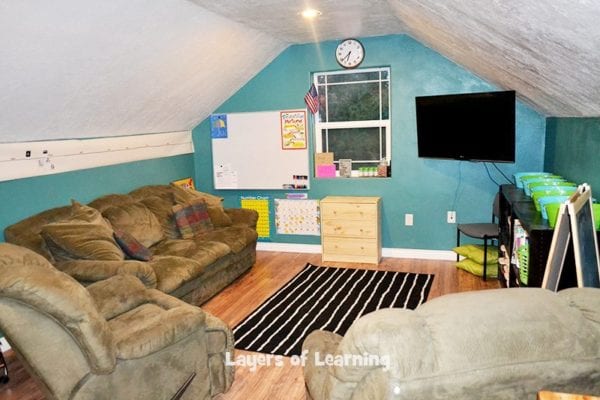 This is our comfy lounge area of our school room. We do group lessons here, but kids also use it as an escape when they want to work away from the others. We also have a group table and individual desk areas for each of us.