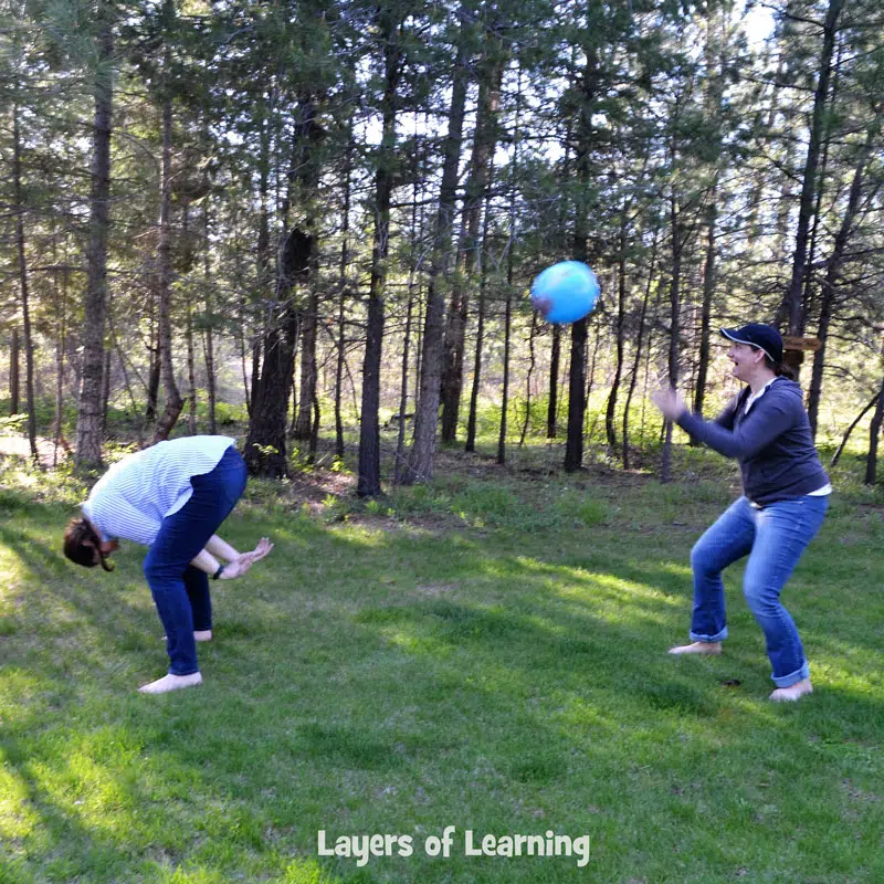 Karen and Michelle tossing a globe beach ball